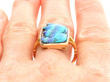 Black Opal Cameo Ring in Yellow Gold on finger