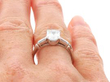 Asscher Diamond Solitaire in Platinum on finger