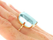 Gold Emerald Cut Aquamarine Ring being worn