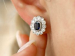 Antique Oval Sapphire and Diamond Earring in ear