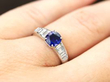 Vintage Sapphire Ring with Diamond Baguettes on finger