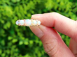 Five Stone Opal Ring in Gold outside