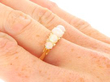 wearing Five Stone Opal Ring in Gold