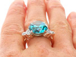 Antique Blue Zircon and diamond Engagement Ring on finger