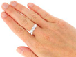 Wearing Round Brilliant Cut Diamond Trilogy Ring