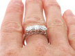 Round Brilliant Cut Diamond Trilogy Ring on Finger