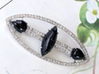 Navette Onyx and Diamond Brooch in platinum
