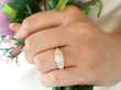 wearing Opal Trilogy Ring with Diamonds in Yellow Gold