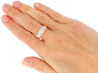 Opal Trilogy Ring with Diamonds in Yellow Gold on hand