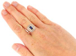 wearing Double Halo Emerald Cut Sapphire Ring