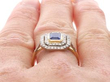 Double Halo Emerald Cut Sapphire Ring on hand