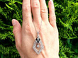 Black Onyx and Diamond Pendant in Platinum outside