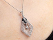 wearing Black Onyx and Diamond Pendant