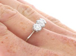 Antique Diamond and Platinum Three Stone Ring On Hand