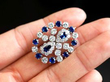 Circular Sapphire Brooch In hand