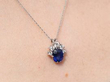 Vintage Cushion Cut Sapphire Pendant in White Gold being worn