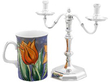 Small Vintage Silver Candelabra next to a mug