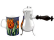 Antique Silver Side Handled Hot Chocolate Jug next to a mug