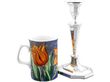 Piano Style Sterling Silver Candlestick next to a mug