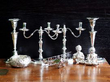 silver ornaments, peppers and candle holders