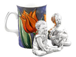Victorian Novelty Silver Baby Salt and Pepper Shaker next to a mug