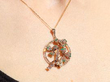 wearing Victorian Emerald Pearl and Diamond Pendant