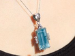 wearing 14 Carat Aquamarine Pendant Necklace in White Gold
