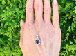 Vintage Sapphire and Diamond Cluster Pendant outside
