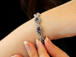 Blue Sapphire and Diamond Bracelet in White Gold wearing