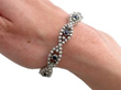 Blue Sapphire and Diamond Bracelet in White Gold being worn