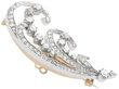 Scrolling Feather Diamond Brooch in Yellow Gold setting