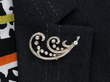 Scrolling Feather Diamond Brooch in Yellow Gold wearing