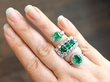 emerald rings stacked on finger