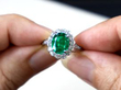 Zambia Oval Cut Emerald and Diamond Ring in platinum