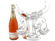 Antique Silver George V Epergne Centrepiece next to a bottle