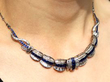 Luxury Sapphire Necklace with Diamonds being worn