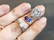 gemstone rings stacked on finger