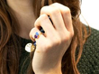Gemstone ring on hand