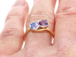 Antique Pink and Blue Sapphire Ring in Yellow Gold on finger