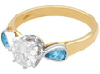 Ring with Pear Cut Aquamarine Side Stones
