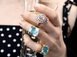 gemstone rings being worn