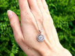 1920s Diamond Halo Pendant Necklace in Platinum outside