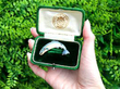 boxed Enamel Salmon Brooch in Yellow Gold outside