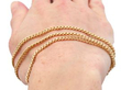 gold chain on wrist