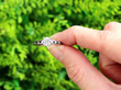 Solitaire Ring with Sapphire and Diamond Shoulders outside