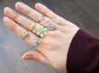 gemstone rings on hand