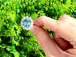 Blue High Zircon Cluster Ring in White Gold outside