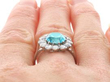 Blue High Zircon Cluster Ring in White Gold being worn