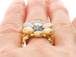Opal Ring in Yellow Gold being worn