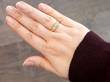 Antique Three Stone Diamond Ring in Gold being worn